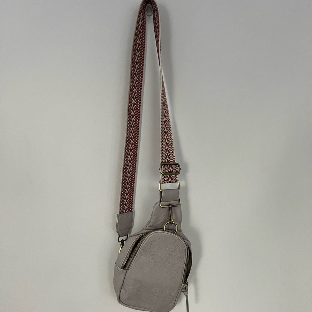 Anthropologie purple crossbody purse with printed strap